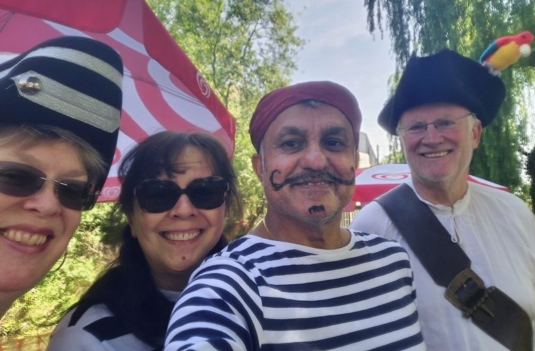 Adults dressed as pirates